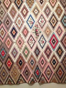 A quilt pieced in diamonds